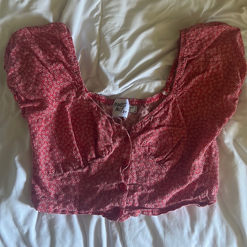 princess polly; size 4; red floral button up top.